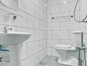 Koupelna v ubytování Hotel Eco Desaru