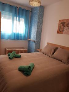 Postel nebo postele na pokoji v ubytování Ola Betica Tarifa + 6 fotografií