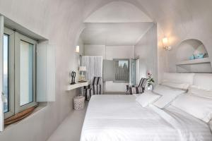 Letto o letti in una camera di Mythical Blue Luxury Suites