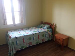 Postel nebo postele na pokoji v ubytování Duplex apartaments