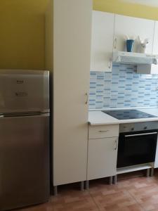 Kuchyň nebo kuchyňský kout v ubytování Duplex apartaments + 5 fotografií
