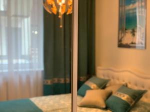Posteľ alebo postele v izbe v ubytovaní Apartament Jantarowe Zacisze Blue