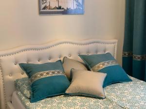 Posteľ alebo postele v izbe v ubytovaní Apartament Jantarowe Zacisze Blue