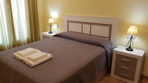Postel nebo postele na pokoji v ubytování Al Andalus Thalassa III VERARENTAL-COM