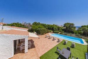 an image of a villa with a swimming pool at Villa San Cristobal by 3VILLAS in Binibeca