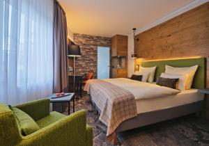 Säng eller sängar i ett rum på Hotel Restaurant Burg-Klause