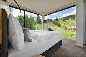 Posteľ alebo postele v izbe v ubytovaní Grand Hotel Hradec