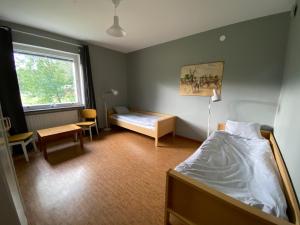 Katil atau katil-katil dalam bilik di Vojakkala Vandrarhem