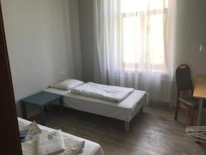 Postel nebo postele na pokoji v ubytování Guesthouse Jakob Lenz