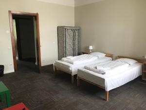 Postel nebo postele na pokoji v ubytování Guesthouse Jakob Lenz