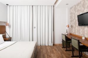 TV a/nebo společenská místnost v ubytování A for Athens