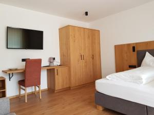 Postel nebo postele na pokoji v ubytování Garni B&B Chi Vai
