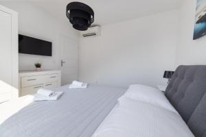 Postel nebo postele na pokoji v ubytování Apartments Blanka House