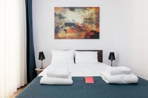 Posteľ alebo postele v izbe v ubytovaní Varsovia Comfort