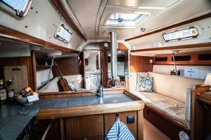 a kitchen in an rv with a sink at Segelyacht Bremen City in Bremen