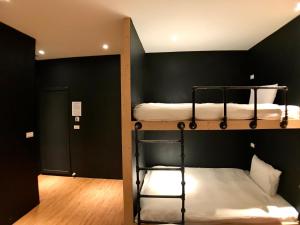 Letto o letti in una camera di Martin Wales Inn