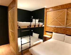 Letto o letti in una camera di Martin Wales Inn
