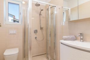 Kúpeľňa v ubytovaní Villa Elena Deluxe mit Whirlpool und beheiztem Pool am Meer und wunderschönen Blick auf die Brijuni Inseln