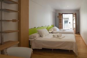 Posteľ alebo postele v izbe v ubytovaní Pucela apartmets