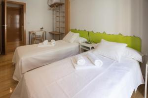 Posteľ alebo postele v izbe v ubytovaní Pucela apartmets