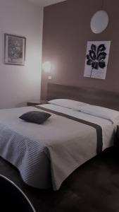 Postel nebo postele na pokoji v ubytování Hotel Kristall