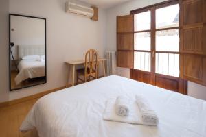 Posteľ alebo postele v izbe v ubytovaní Pucela apartmets
