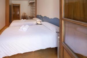 Posteľ alebo postele v izbe v ubytovaní Pucela apartmets