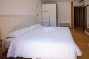 Posteľ alebo postele v izbe v ubytovaní Pucela apartmets