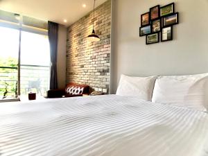 Letto o letti in una camera di Martin Wales Inn