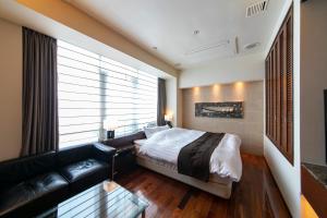 HOTEL APERTO (Adult Only)客房内的一张或多张床位