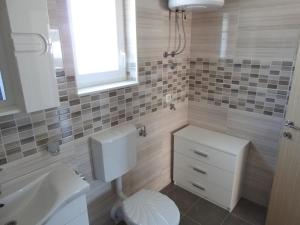 Kúpeľňa v ubytovaní Apartmani Hrvoje Klarić - Srima