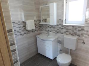 Kúpeľňa v ubytovaní Apartmani Hrvoje Klarić - Srima