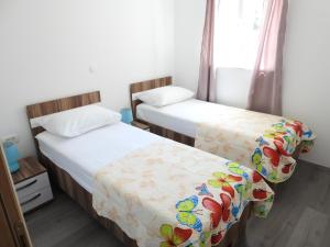 Posteľ alebo postele v izbe v ubytovaní Apartmani Hrvoje Klarić - Srima
