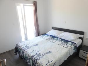 Posteľ alebo postele v izbe v ubytovaní Apartmani Hrvoje Klarić - Srima