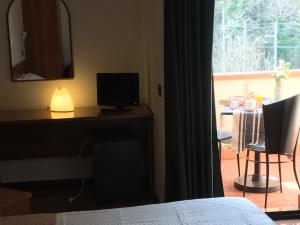 TV a/nebo společenská místnost v ubytování Hotel Kristall