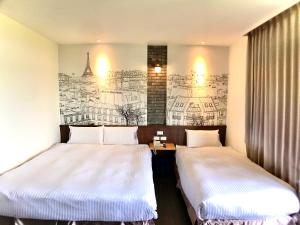 Letto o letti in una camera di Martin Wales Inn