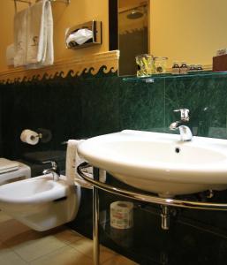 a bathroom with a sink and a toilet at Locanda A Cà Du Gigante in Monterosso al Mare
