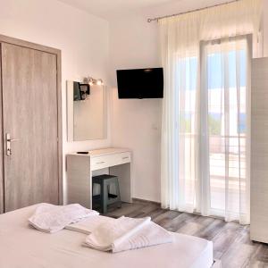 Postel nebo postele na pokoji v ubytování Be Happy Apartments