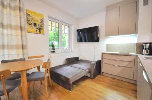 Kuchyňa alebo kuchynka v ubytovaní Apartament harmonic aparts