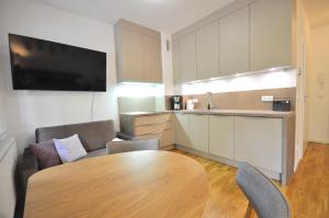 Kuchyňa alebo kuchynka v ubytovaní Apartament harmonic aparts