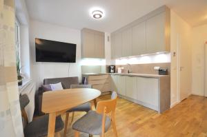 Kuchyňa alebo kuchynka v ubytovaní Apartament harmonic aparts