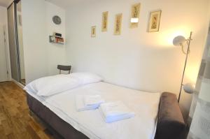 Posteľ alebo postele v izbe v ubytovaní Apartament harmonic aparts