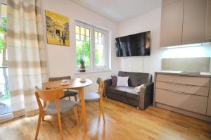 Kuchyňa alebo kuchynka v ubytovaní Apartament harmonic aparts + 37 fotografií