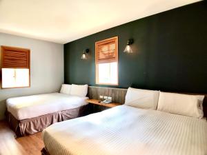 Letto o letti in una camera di Martin Wales Inn