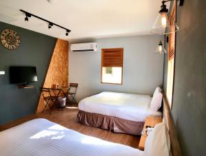 Letto o letti in una camera di Martin Wales Inn