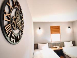 Letto o letti in una camera di Martin Wales Inn