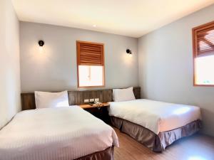 Letto o letti in una camera di Martin Wales Inn