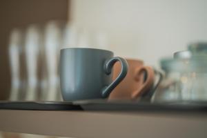 Príslušenstvo na prípravu kávy alebo čaju v ubytovaní Gemini Apartments Siófok I., III.