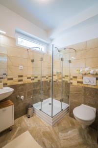 Kúpeľňa v ubytovaní Gemini Apartments Siófok I., III.