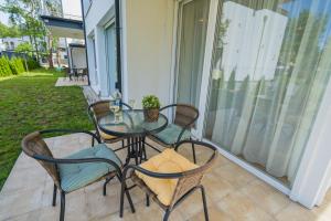 Balkón alebo terasa v ubytovaní Gemini Apartments Siófok I., III.